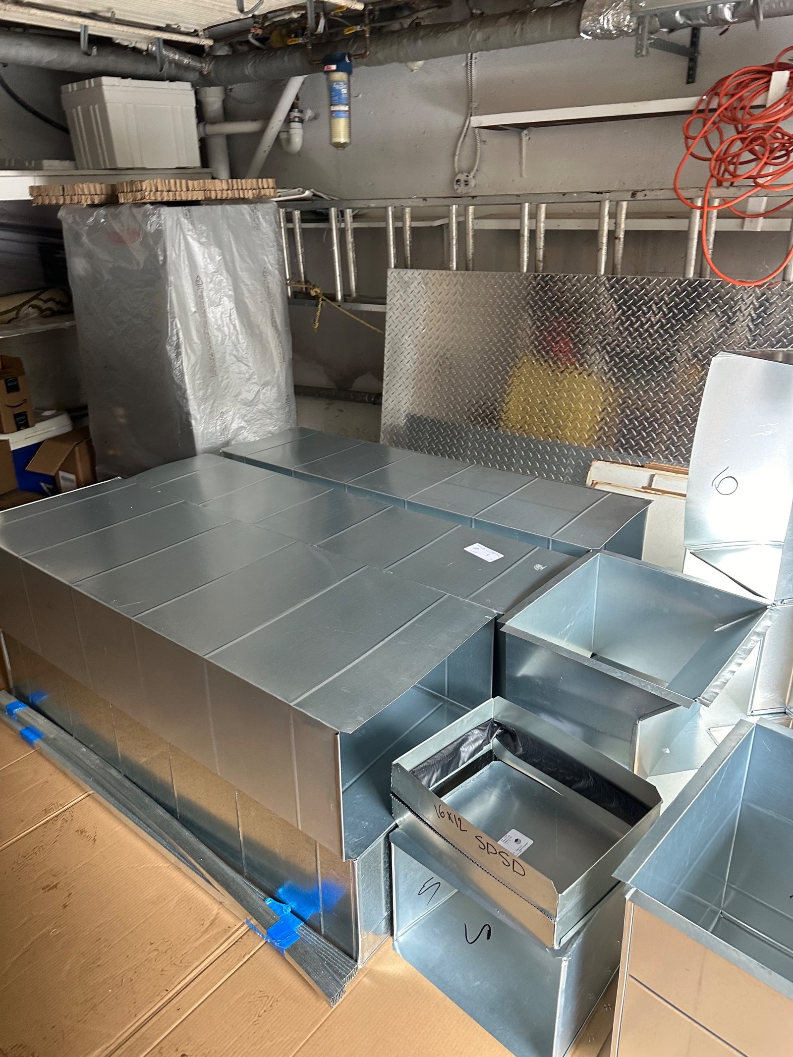 Sheet metal trunk duct and takeoffs fabricated on site